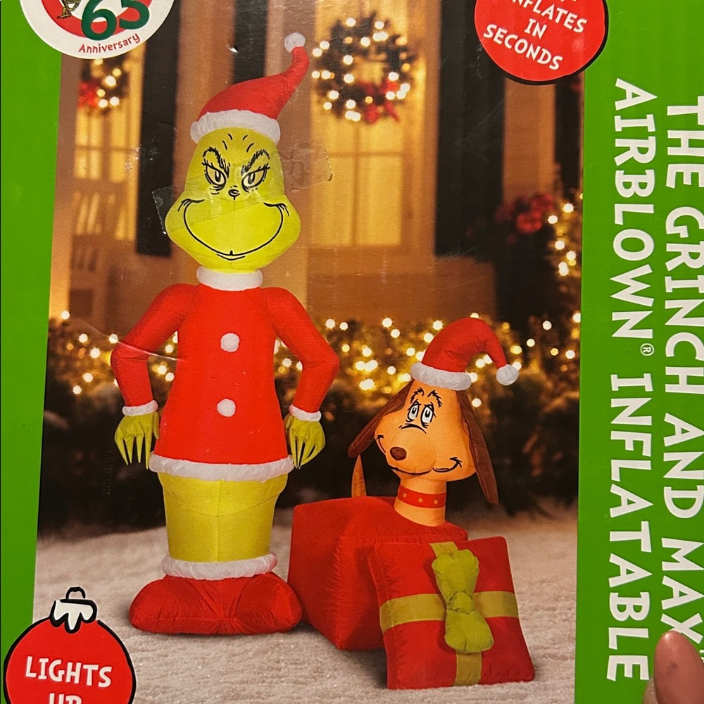 Grinch and Max Inflatable with Santa Outfits
